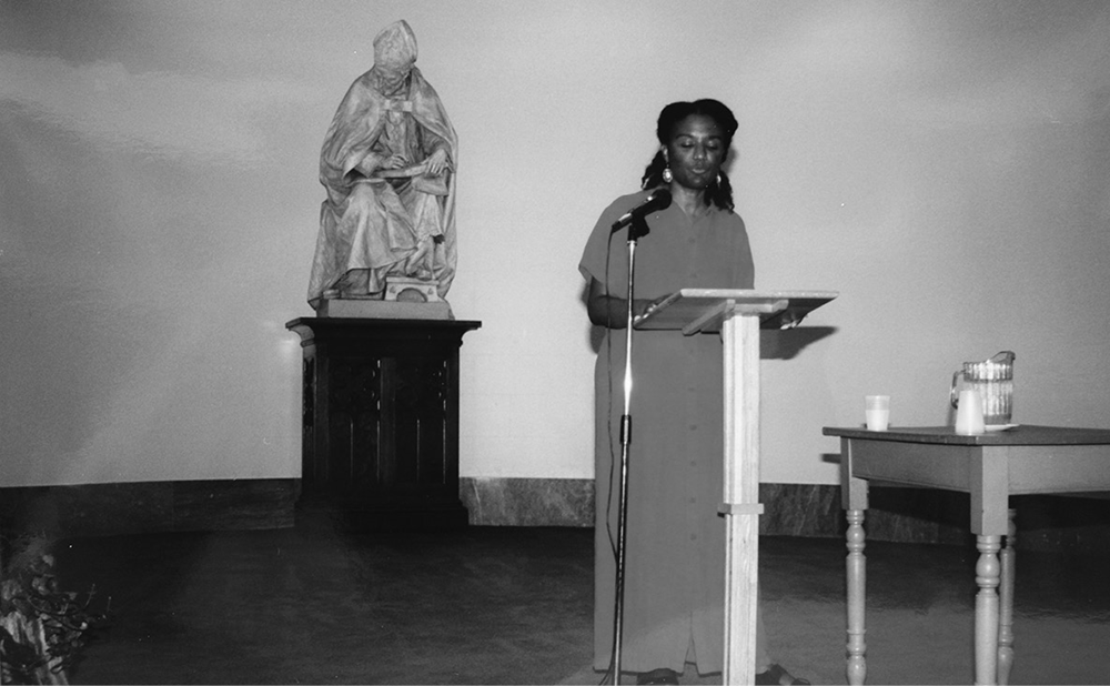 Pictured above: Mullen reading at Cave Canem, at Mount Saint Alphonsus in Esopus, New York, 1999.